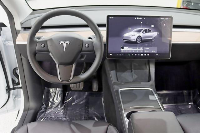 used 2025 Tesla Model Y car, priced at $41,900