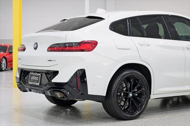 used 2023 BMW X4 car, priced at $49,890