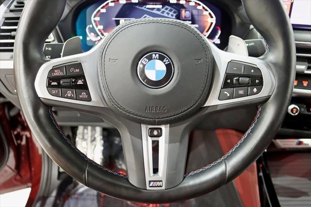 used 2023 BMW X4 car, priced at $54,800
