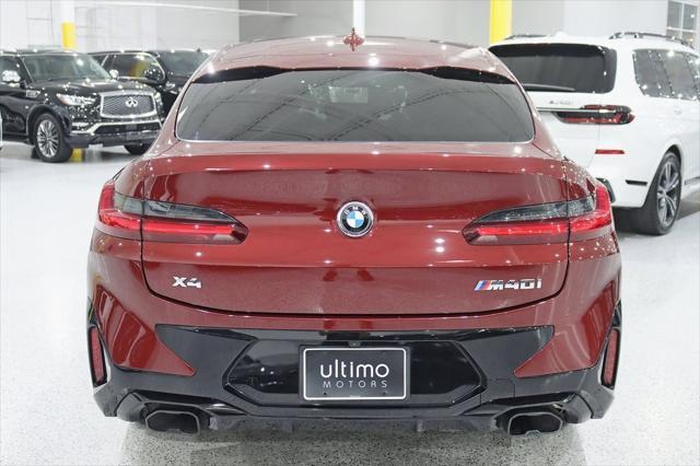 used 2023 BMW X4 car, priced at $54,800