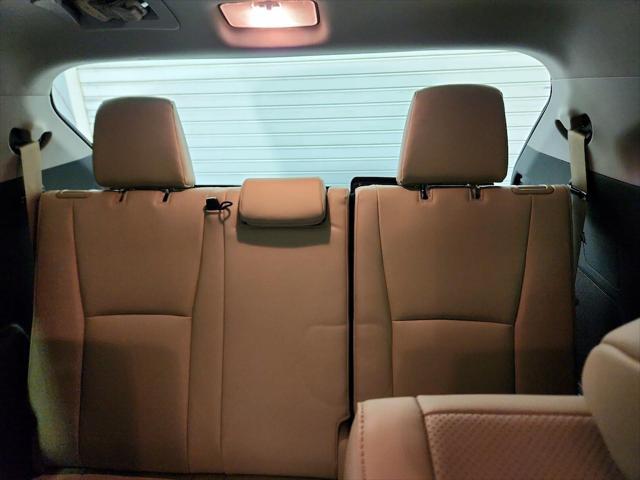 used 2023 Toyota Highlander Hybrid car, priced at $50,998