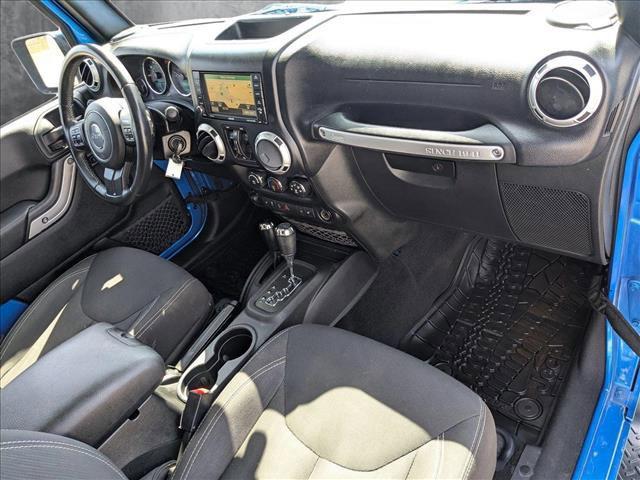 used 2015 Jeep Wrangler Unlimited car, priced at $15,392