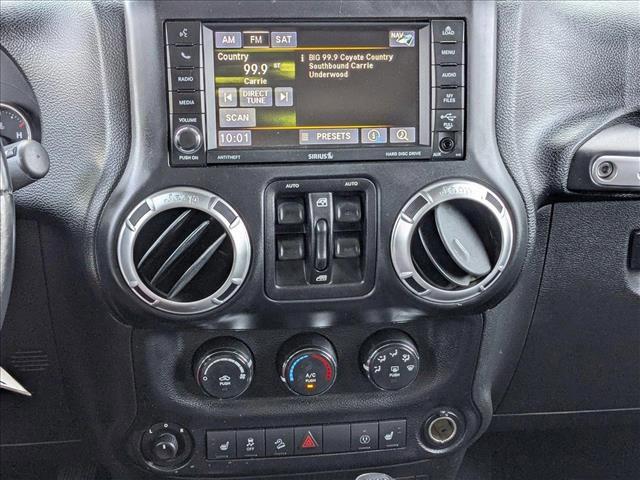 used 2015 Jeep Wrangler Unlimited car, priced at $15,392