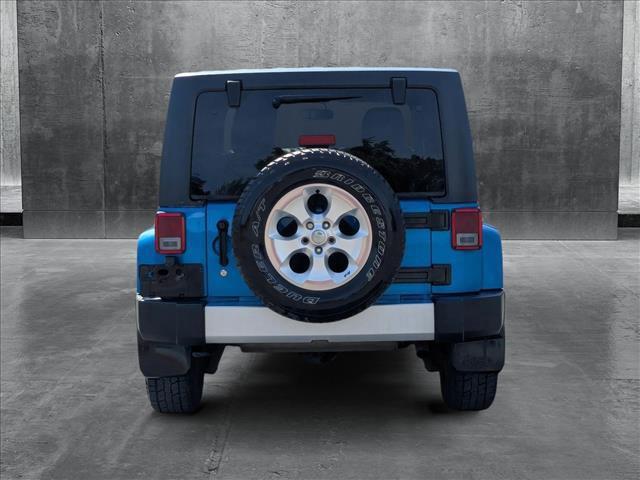 used 2015 Jeep Wrangler Unlimited car, priced at $15,392