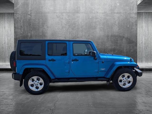 used 2015 Jeep Wrangler Unlimited car, priced at $15,392