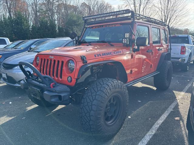 used 2015 Jeep Wrangler Unlimited car, priced at $27,500