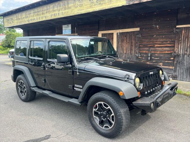 used 2012 Jeep Wrangler Unlimited car, priced at $11,999