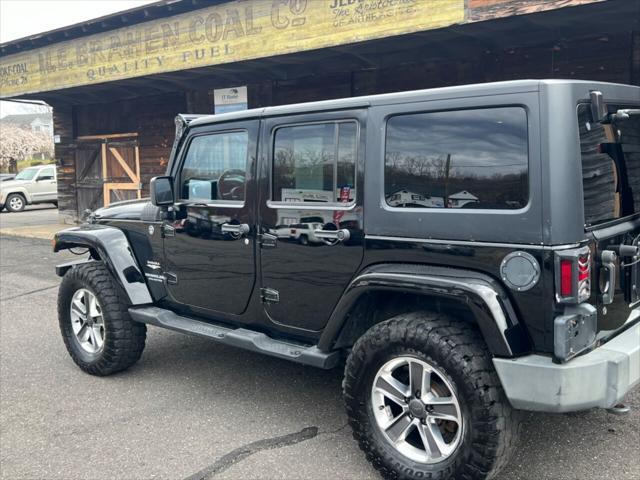 used 2011 Jeep Wrangler Unlimited car, priced at $11,500