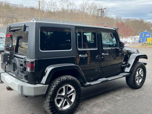 used 2011 Jeep Wrangler Unlimited car, priced at $11,500