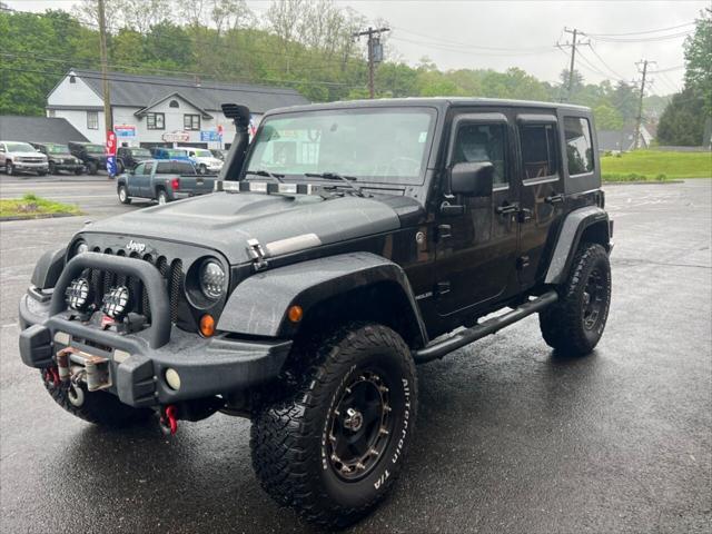 used 2010 Jeep Wrangler Unlimited car, priced at $13,999
