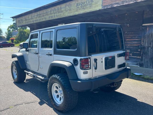 used 2012 Jeep Wrangler Unlimited car, priced at $13,499