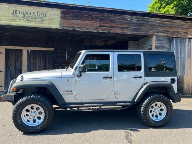 used 2012 Jeep Wrangler Unlimited car, priced at $13,499