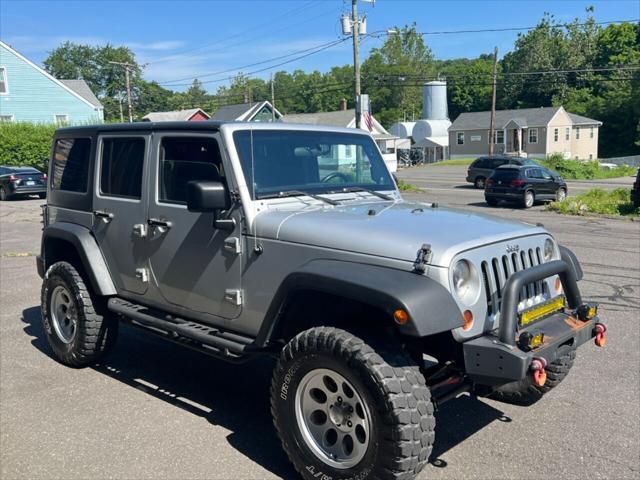 used 2012 Jeep Wrangler Unlimited car, priced at $13,499