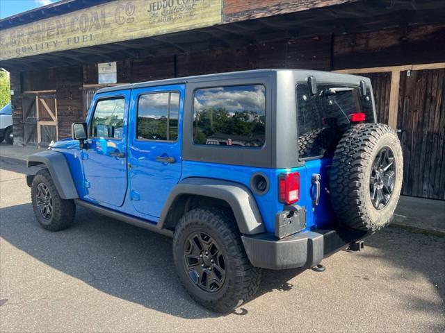 used 2016 Jeep Wrangler Unlimited car, priced at $15,999