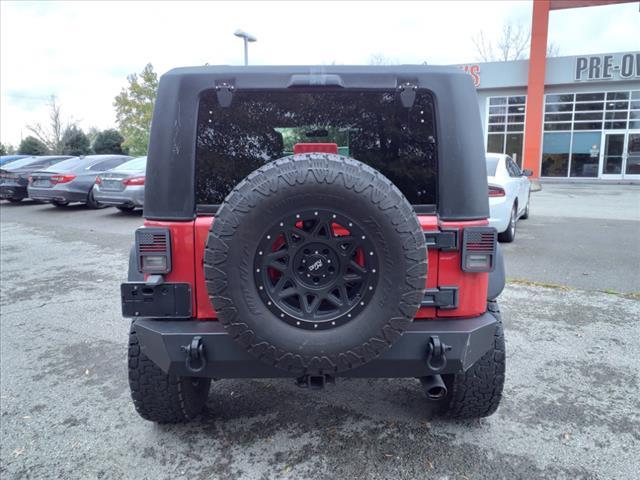 used 2010 Jeep Wrangler Unlimited car, priced at $13,900