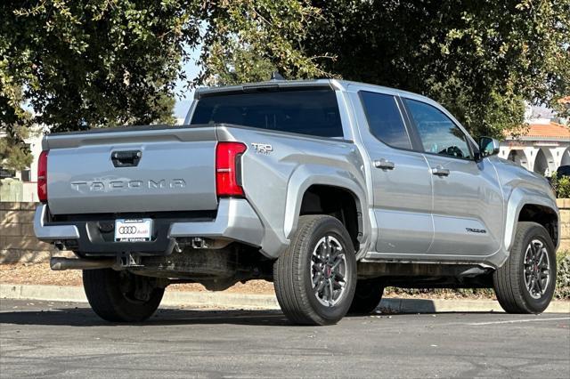 used 2024 Toyota Tacoma car, priced at $38,990