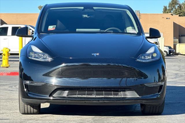 used 2023 Tesla Model Y car, priced at $32,533