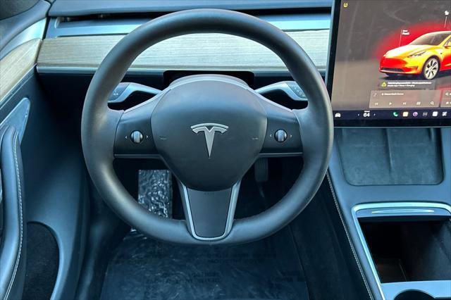 used 2023 Tesla Model Y car, priced at $32,533