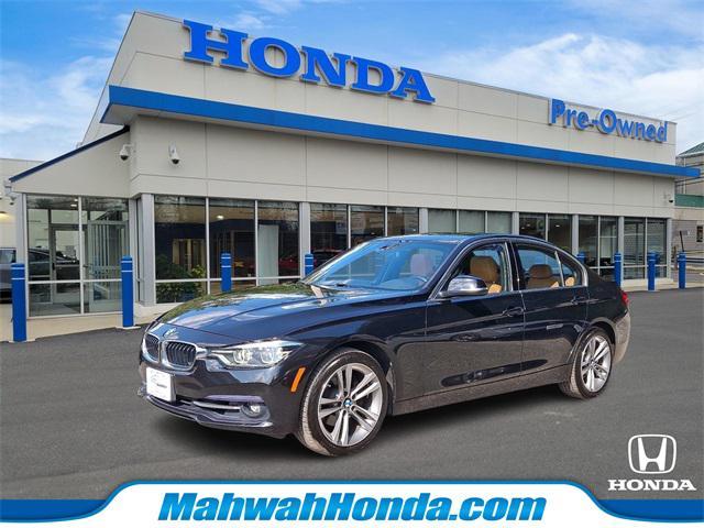 used 2018 BMW 330 car, priced at $13,699