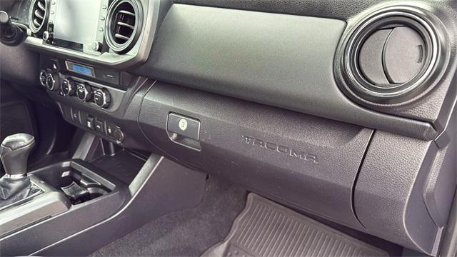 used 2021 Toyota Tacoma car, priced at $25,993