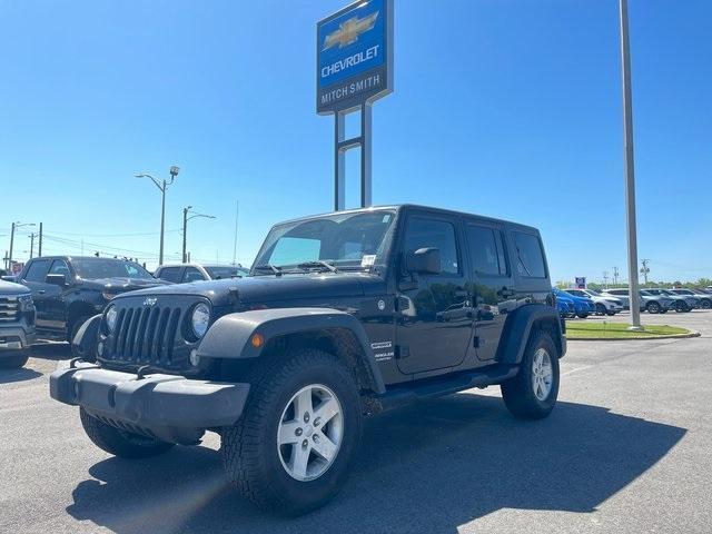 used 2015 Jeep Wrangler Unlimited car, priced at $16,993