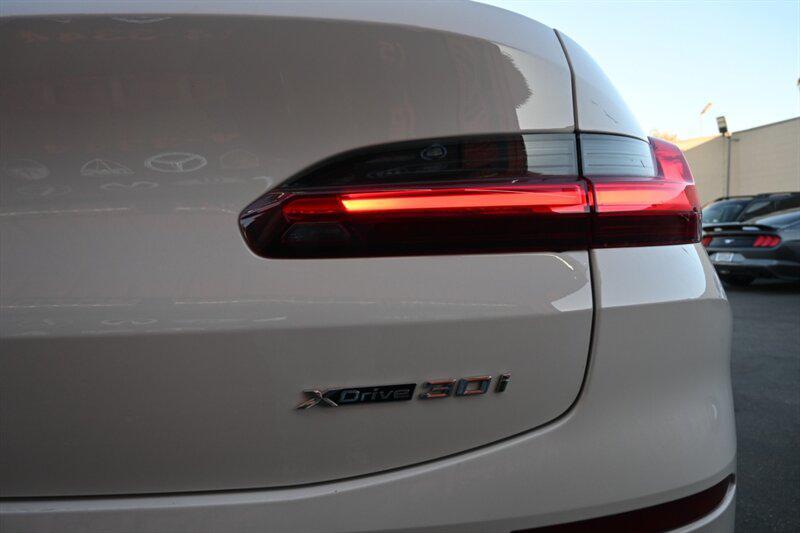 used 2023 BMW X4 car, priced at $34,495
