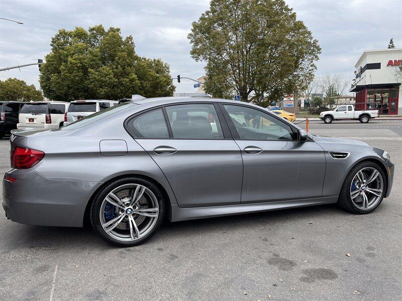 used 2013 BMW M5 car, priced at $18,995