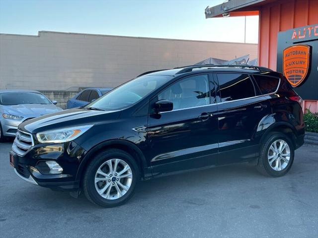 used 2018 Ford Escape car, priced at $11,495