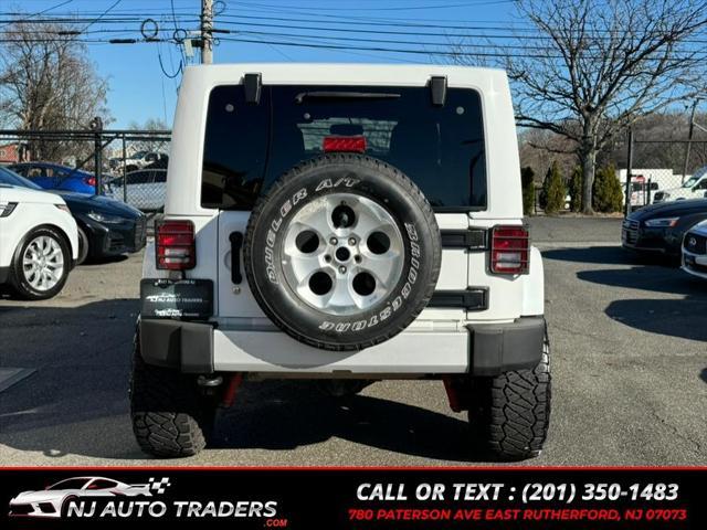 used 2013 Jeep Wrangler Unlimited car, priced at $16,888