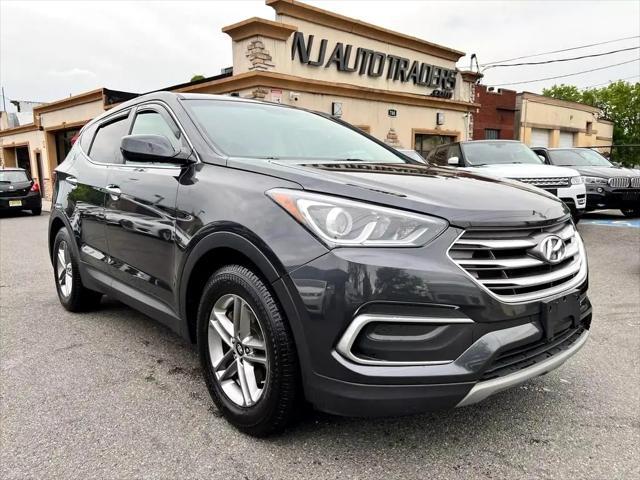 used 2018 Hyundai Santa Fe Sport car, priced at $11,988