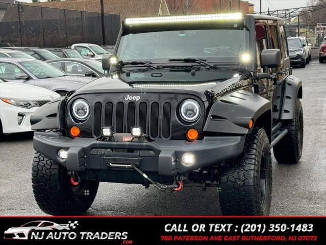 used 2011 Jeep Wrangler Unlimited car, priced at $17,988