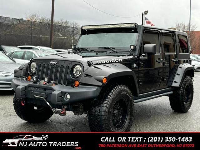 used 2011 Jeep Wrangler Unlimited car, priced at $17,988