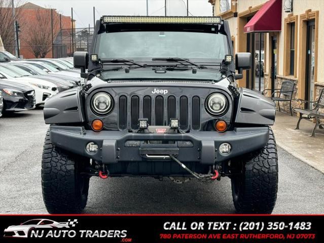 used 2011 Jeep Wrangler Unlimited car, priced at $17,988