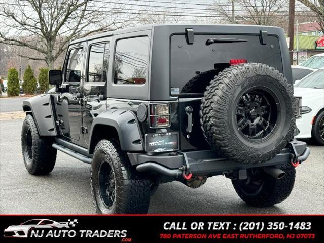 used 2011 Jeep Wrangler Unlimited car, priced at $17,988