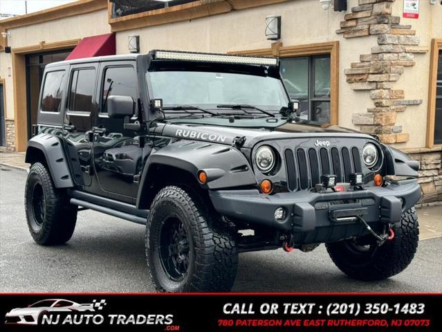 used 2011 Jeep Wrangler Unlimited car, priced at $17,988