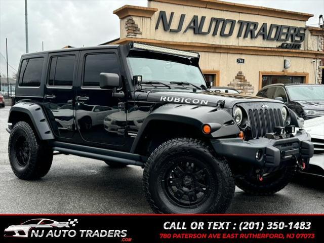 used 2011 Jeep Wrangler Unlimited car, priced at $17,988