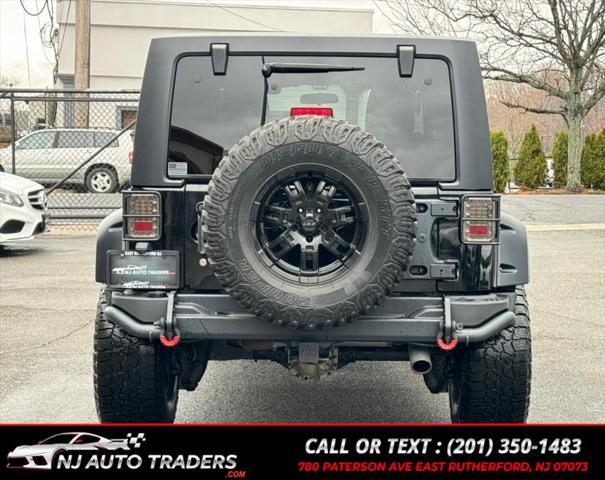 used 2011 Jeep Wrangler Unlimited car, priced at $17,988