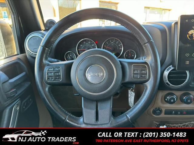 used 2012 Jeep Wrangler Unlimited car, priced at $14,988