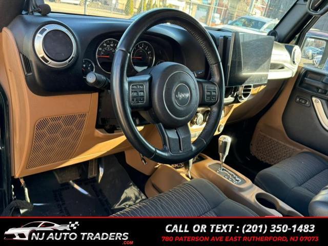 used 2012 Jeep Wrangler Unlimited car, priced at $14,988