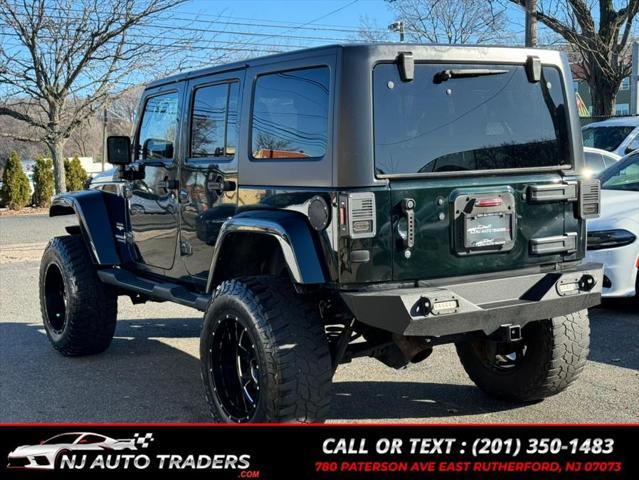 used 2012 Jeep Wrangler Unlimited car, priced at $14,988