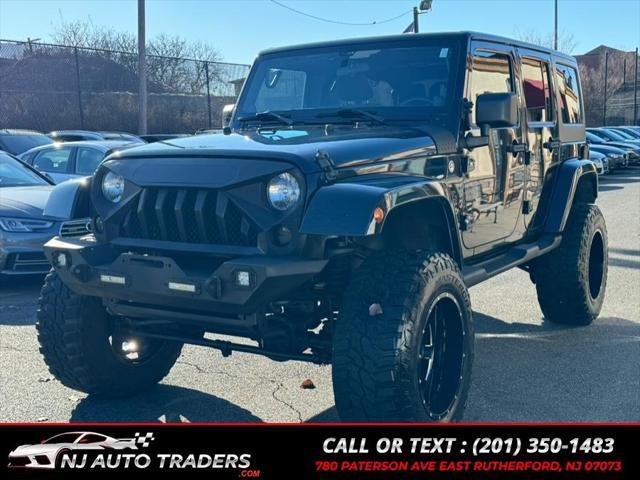 used 2012 Jeep Wrangler Unlimited car, priced at $14,988