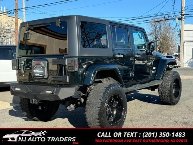 used 2012 Jeep Wrangler Unlimited car, priced at $14,988