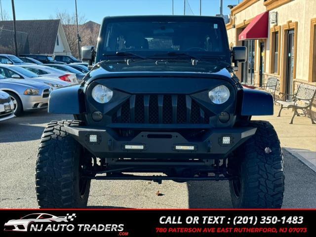 used 2012 Jeep Wrangler Unlimited car, priced at $14,988