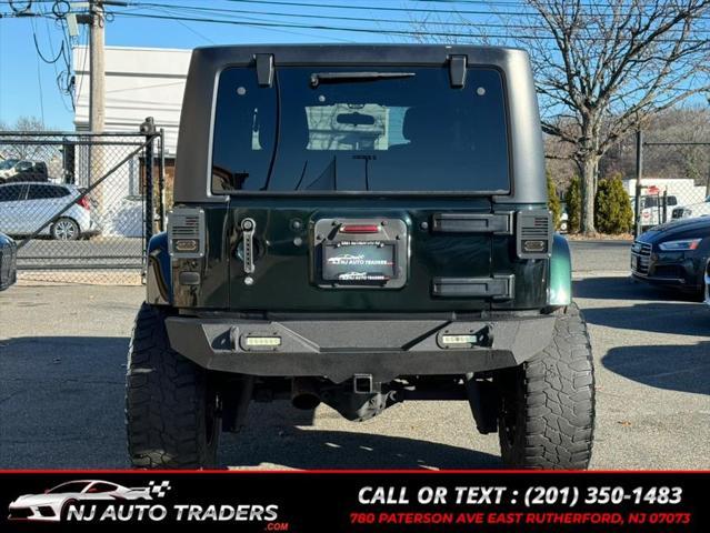 used 2012 Jeep Wrangler Unlimited car, priced at $14,988