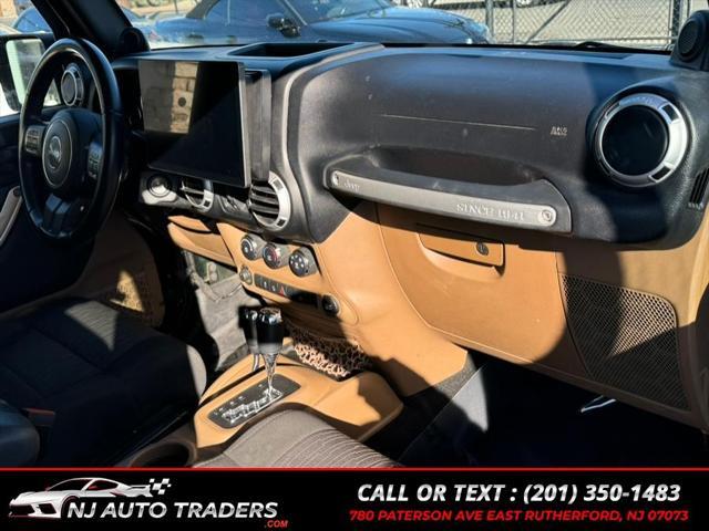 used 2012 Jeep Wrangler Unlimited car, priced at $14,988