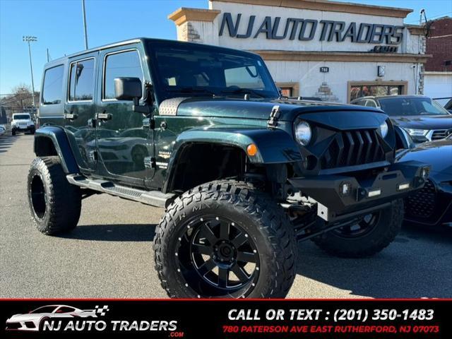 used 2012 Jeep Wrangler Unlimited car, priced at $14,988