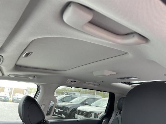 new 2025 Kia Carnival Hybrid car, priced at $52,768