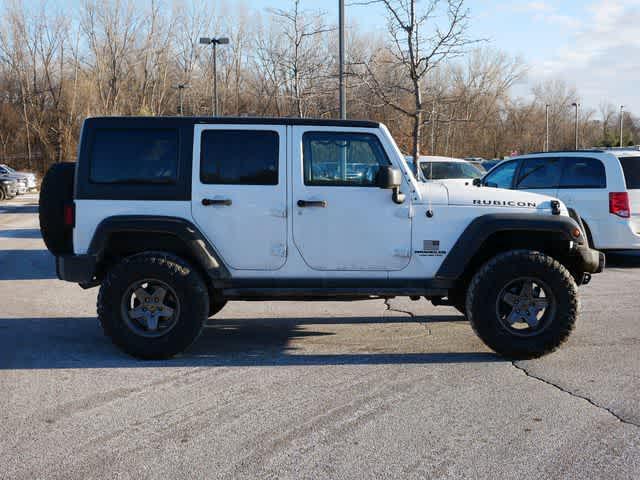 used 2012 Jeep Wrangler Unlimited car, priced at $18,691