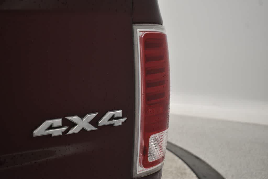 used 2018 Ram 1500 car, priced at $23,353