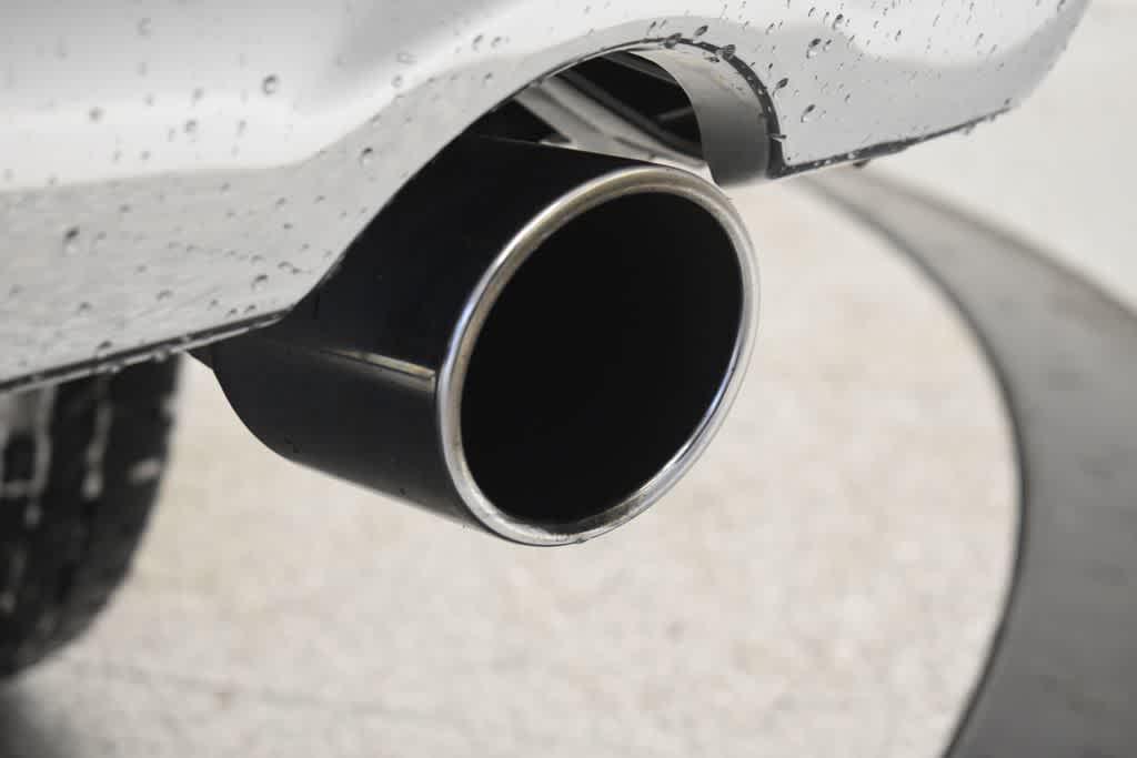 used 2018 Ram 1500 car, priced at $23,353